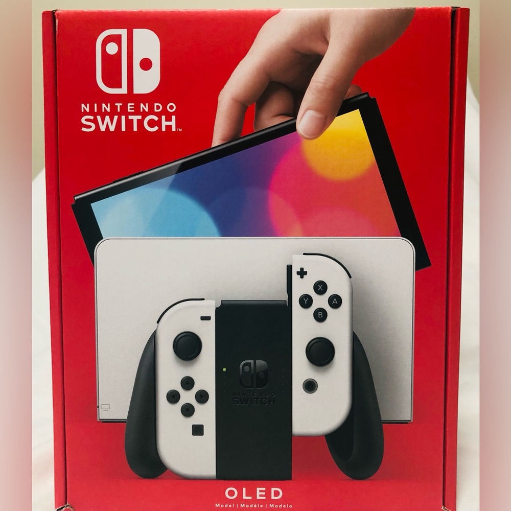 New Nintendo Switch OLED 64 GB with white joy-con.